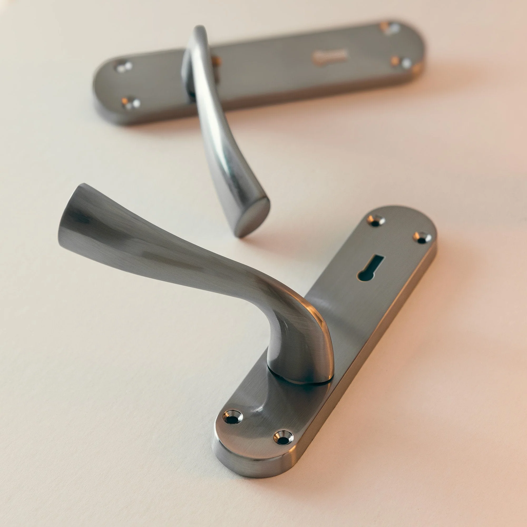 Scimitar Lever and Lock on Backplate Bathroom Door Handle Set - Satin Chrome - Image 4